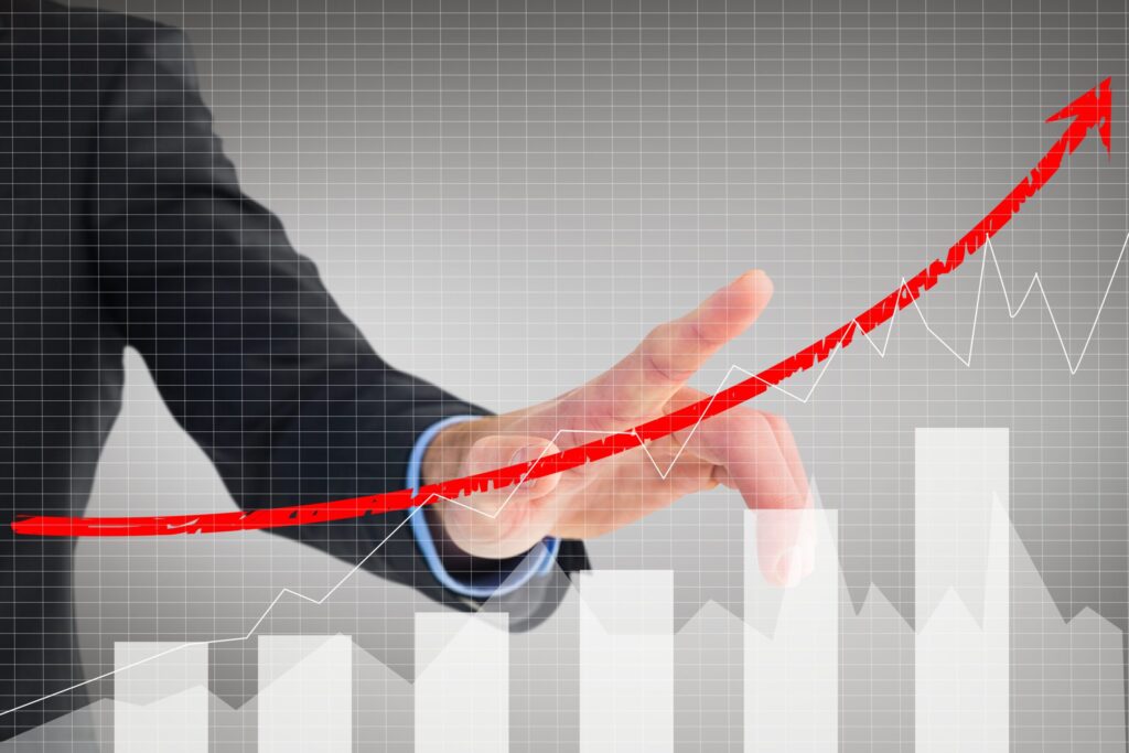 Day Trading For Beginners: The Complete Guide composite of businessman pointing at rising graph