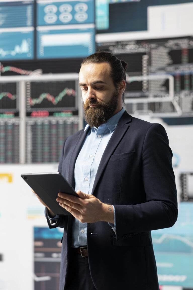 Modern Businessman Uses Digital Graphs Analytics Improve Finance Models 768x1152 1