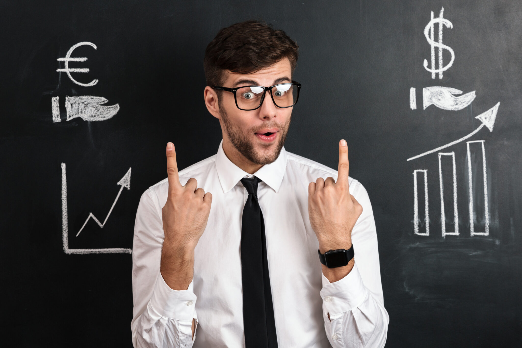 Surprised Handsome Young Man Glasses Pointing With Two Fingers Upward 2048x1365 1